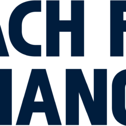 Organizācijas logo: tumši zils uzraksts Reach For change