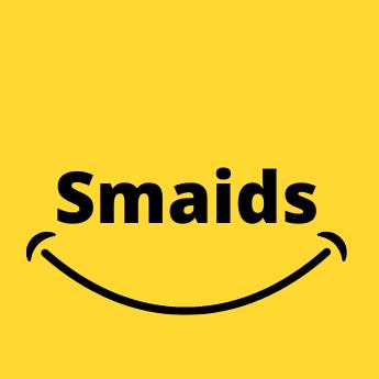 Dzeltens fons ar melnu uzrakstu "Smaids" un smaida simbolu apakšā.